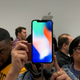 The iPhone X, on a pedestal.